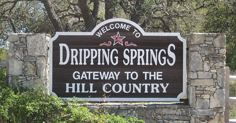 welcome to dripping springs sign