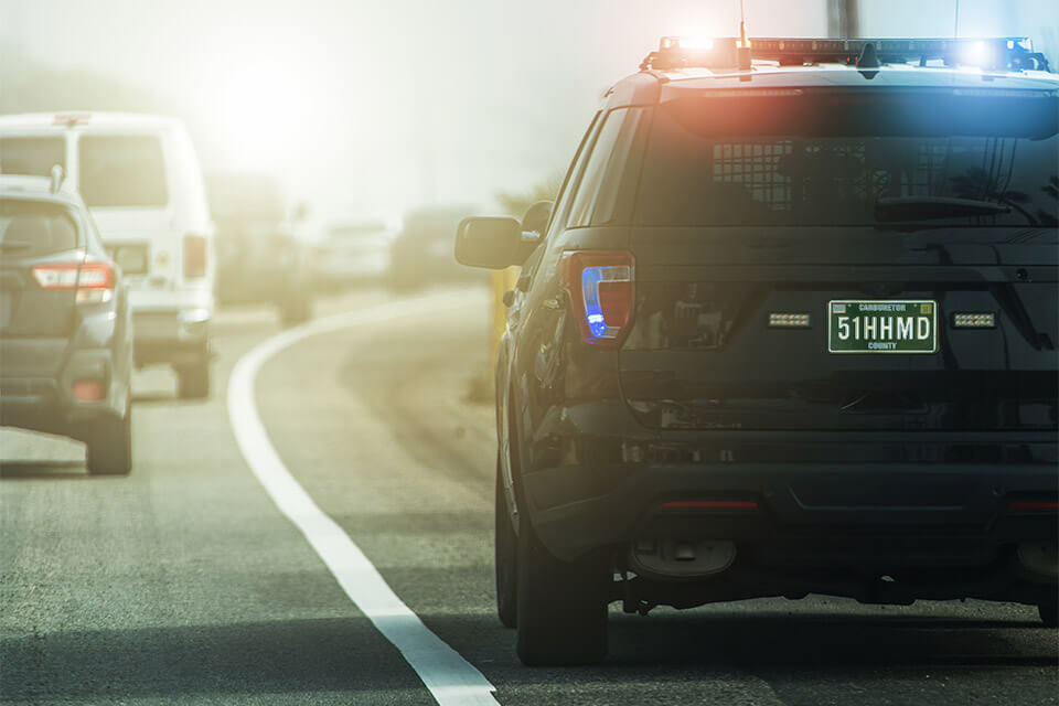 police car in traffic