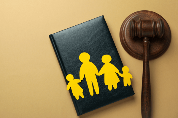 Concept of family law with paper family cutout for family lawyer in San Antonio